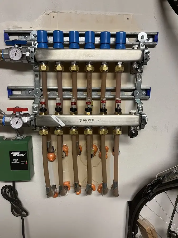 Plumber performing Water Heater Repair at a residential property in Wesley Chapel